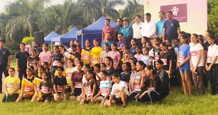 Young athletes posing along with dignitaries. Young athletes posing along with dignitaries.