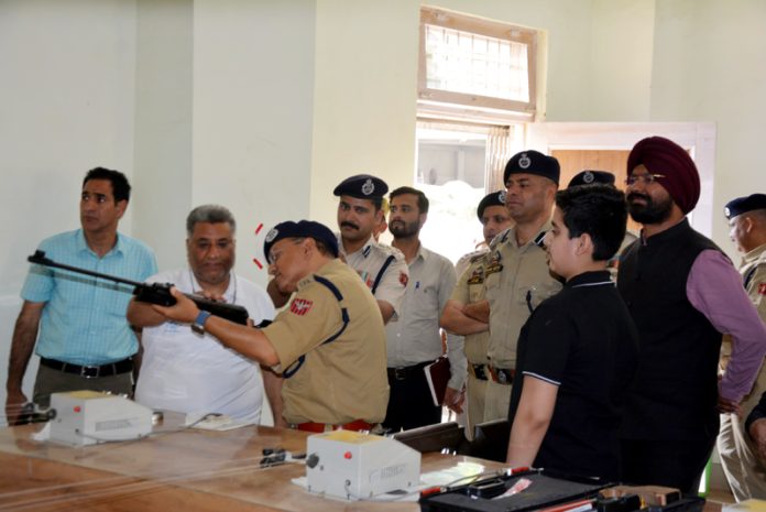 ADGP Anand Jain aiming a target at Rifle Shooting Hall near Sports Stadium Doda.