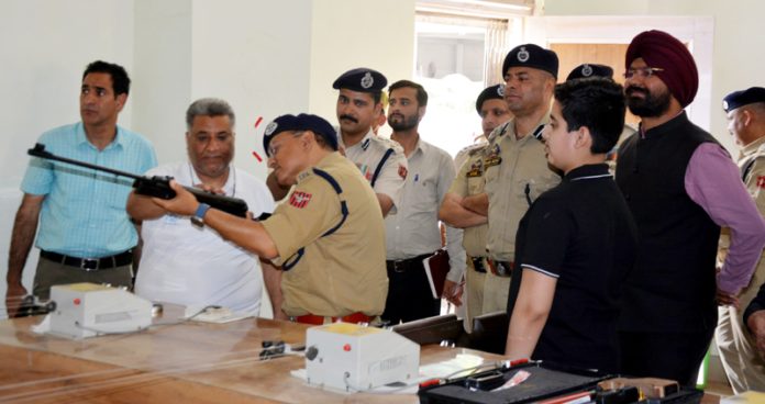 ADGP Anand Jain aiming a target at Rifle Shooting Hall near Sports Stadium Doda. ADGP Anand Jain aiming a target at Rifle Shooting Hall near Sports Stadium Doda.