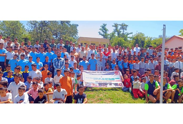 Students of different schools of Reasi participating in Inter-School games on Monday.  