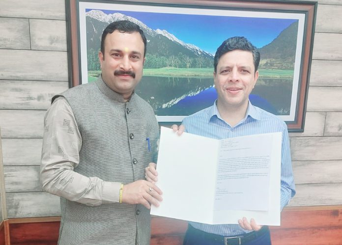 Mahant Rohit Shastri, submitting a memorandum to Sanjeev Verma, Commissioner Secretary in Jammu on Tuesday. Mahant Rohit Shastri, submitting a memorandum to Sanjeev Verma, Commissioner Secretary in Jammu on Tuesday.