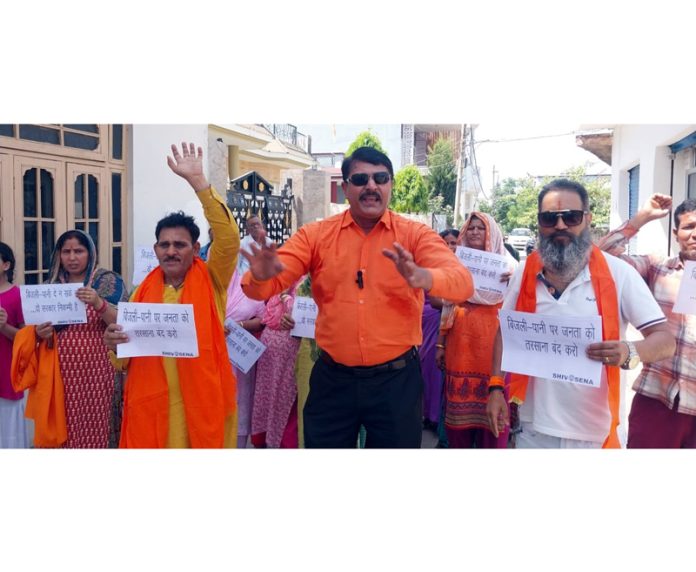 Shiv Sena activists raising slogans during a protest in Jammu on Tuesday. Shiv Sena activists raising slogans during a protest in Jammu on Tuesday.
