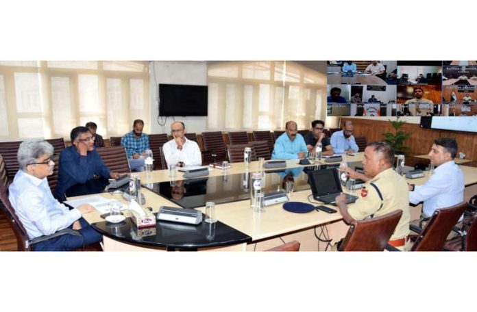 CS Atal Dulloo chairing a meeting at Srinagar on Thursday. CS Atal Dulloo chairing a meeting at Srinagar on Thursday.