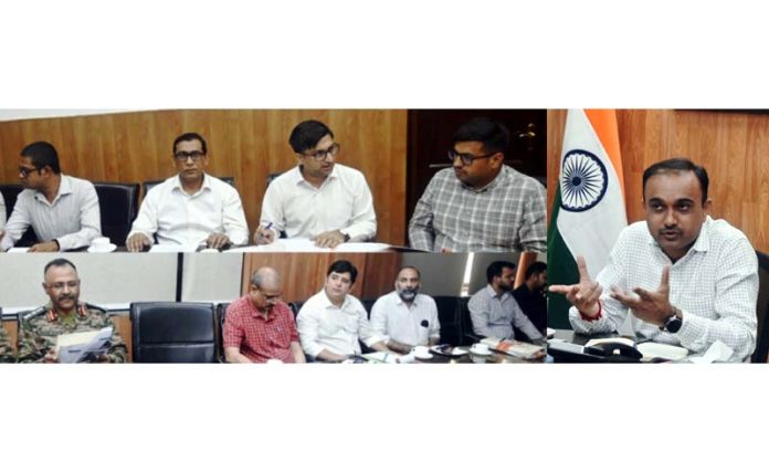 Div Com Ramesh Kumar chairing a meeting at Jammu on Wednesday.
