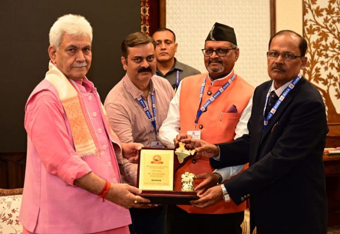 LG Manoj Sinha receiving memento from the Alumni of Allahabad University at Raj Bhawan Srinagar. LG Manoj Sinha receiving memento from the Alumni of Allahabad University at Raj Bhawan Srinagar.
