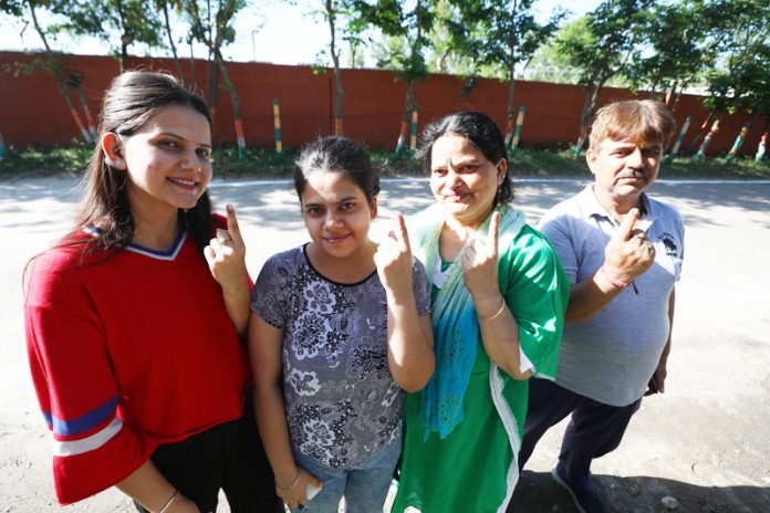 Migrant voters after exercising their right to franchise in Jammu for Srinagar Lok Sabha seat on Monday.— Excelsior/Rakesh