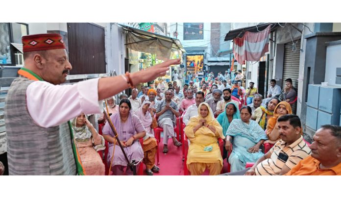 Senior BJP leader Devender Singh Rana addressing public meeting at Gurdaspur on Thursday.
