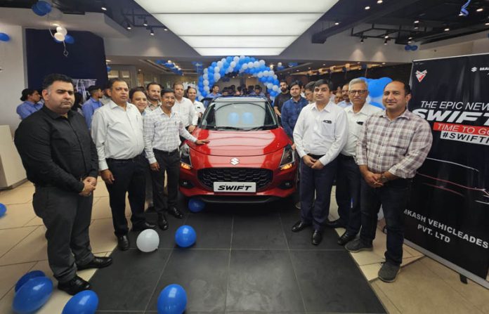 Col Pritam Chand, ED and COO Jamkash Vehicleades launching new Swift in Jammu on Saturday.