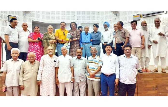 Poets and writers posing together during a programme at Writers' Club, Jammu.