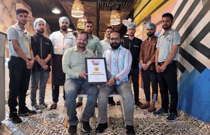 Neeraj Sharma receiving the award.