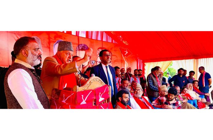 NC president Dr Farooq Abdullah addressing a public gathering in Hazratbal area.