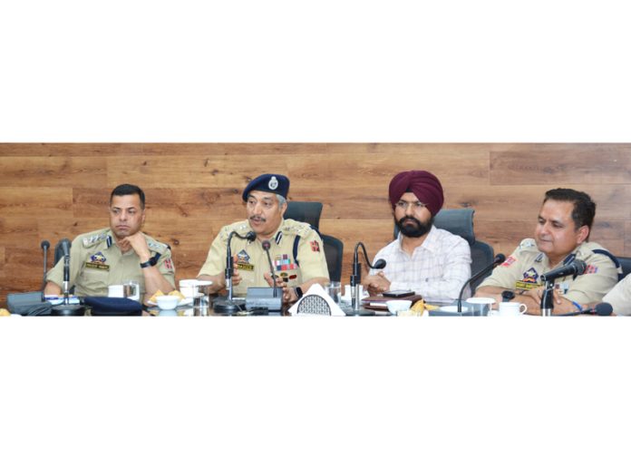 DIG Traffic Jammu Mohd. Haseeb Mughal chairing a meeting on Tuesday.