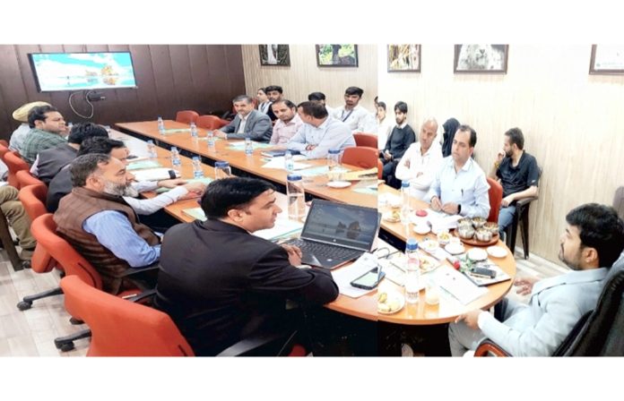 DC Kishtwar Dr Devansh Yadav chairing a meeting on Tuesday.