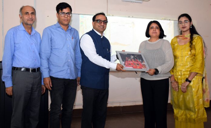 Memento being presented to the guest in awareness programme at SMVDU. Memento being presented to the guest in awareness programme at SMVDU.