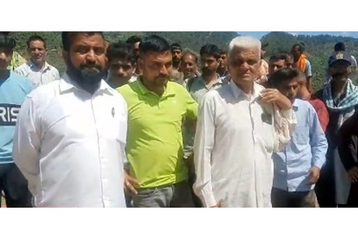 Residents of Barmeen staging protest against the fake protest held by hired people in their village, on Monday. Residents of Barmeen staging protest against the fake protest held by hired people in their village, on Monday.