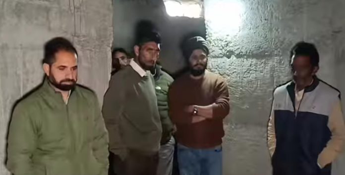 Election staff inspecting maintenance work of a community bunker close to LoC in Poonch. —Excelsior/Waseem