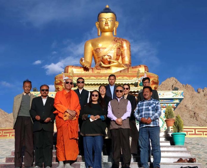 Justice Tashi Rabstan posing along with others during a function organised at MIMC, in Ladakh on Wednesday. Justice Tashi Rabstan posing along with others during a function organised at MIMC, in Ladakh on Wednesday.
