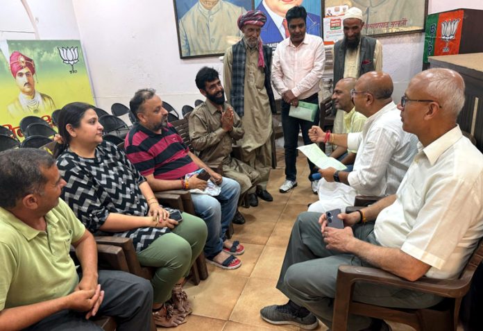 BJP vice president, Yudhvir Sethi listening public grievances at Jammu on Thursday.