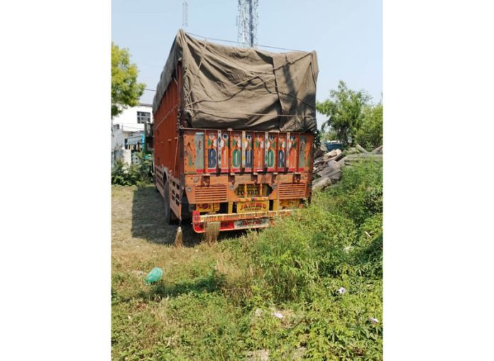 A truck loaded with timber seized at Forest check post in Tehsil Hiranagar on Thursday.