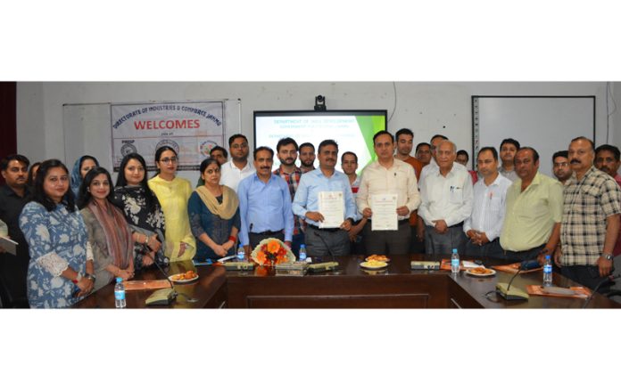 Principal, Government Polytechnic Jammu and General Manager, DIC Jammu along with others posing for a photograph after inking an MoU. Principal, Government Polytechnic Jammu and General Manager, DIC Jammu along with others posing for a photograph after inking an MoU.