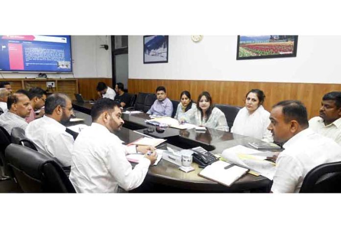 Div Com Jammu Ramesh Kumar chairing a meeting.