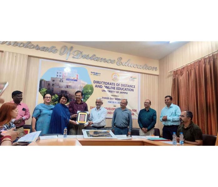 Chief guest being presented a memento by the organizers during valedictory function of three-day workshop. Chief guest being presented a memento by the organizers during valedictory function of three-day workshop.