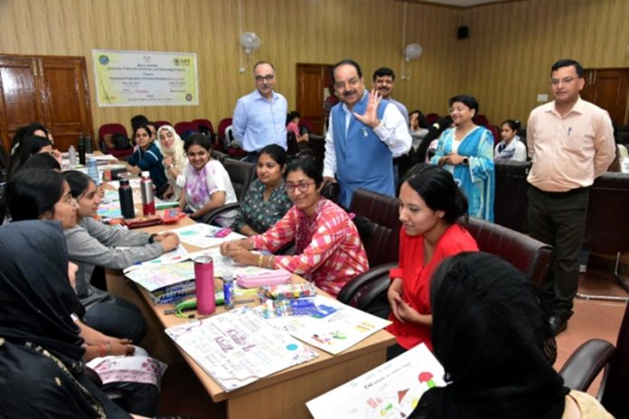 Students participating in poster making event at SKUAST-Jammu on Monday.