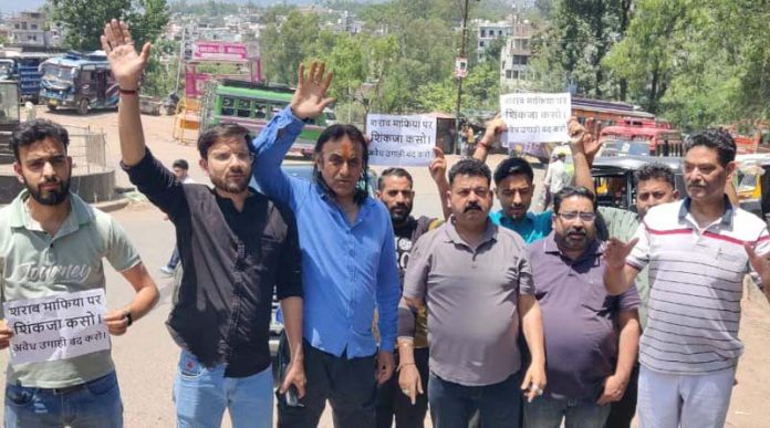Shiv Sena activists raising slogans during a protest in Udhampur on Friday.