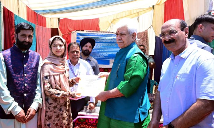 LG Manoj Sinha during Paddy Transplantation Festival on Wednesday. LG Manoj Sinha during Paddy Transplantation Festival on Wednesday.