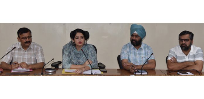 DC Udhampur chairing a meeting on Thursday.