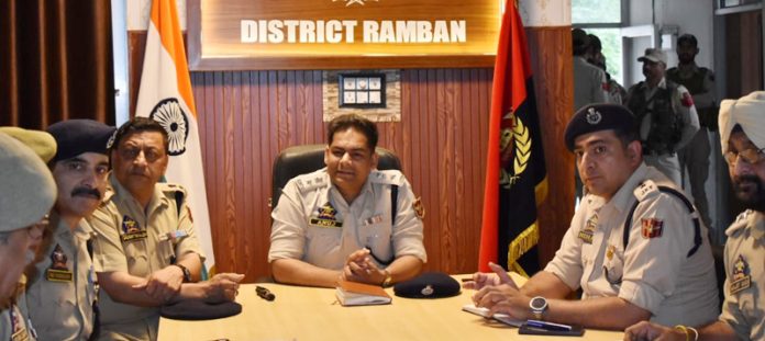 SSP Ramban Anuj Kumar chairing a meeting.