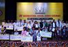 Students posing along with dignitaries during award ceremony at New Delhi.