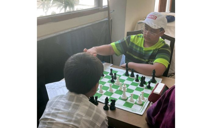 Players displaying keen interest during a Chess game in Jammu.