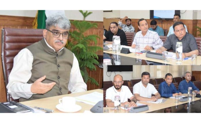 Chief Secretary Atal Dullo chairing a meeting. Chief Secretary Atal Dullo chairing a meeting.
