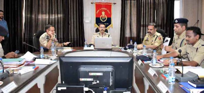 DIG R-P Range, Tajinder Singh chairing security review meeting at Rajouri on Saturday. DIG R-P Range, Tajinder Singh chairing security review meeting at Rajouri on Saturday.