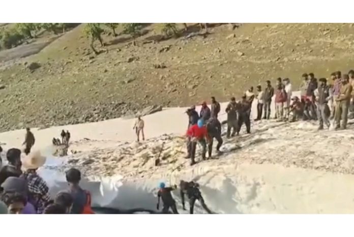 Two tourists resuced after portion of glacier collapes at Snamarg on Sunday. Two tourists resuced after portion of glacier collapes at Snamarg on Sunday.