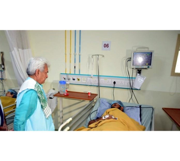 LG Manoj Sinha enquiring the condition of an injured in the GMC Jammu on Monday