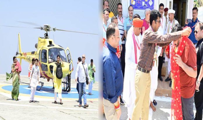 Pilgrims after alighting from the helicopter at Panchhi helipad (left) and CEO SMVDSB Anshul Garg facilitating the yatris (right).