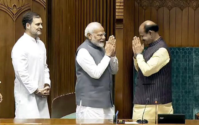 Om Birla being welcomed by Prime Minister Narendra Modi and Congress leader Rahul Gandhi on being elected as the Speaker of the 18th Lok Sabha at Parliament in New Delhi on Wednesday. (UNI) Om Birla being welcomed by Prime Minister Narendra Modi and Congress leader Rahul Gandhi on being elected as the Speaker of the 18th Lok Sabha at Parliament in New Delhi on Wednesday. (UNI)