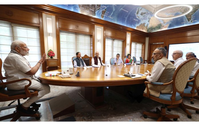 PM Narendra Modi revewing post-cyclone Remal situation, in New Delhi on Sunday.