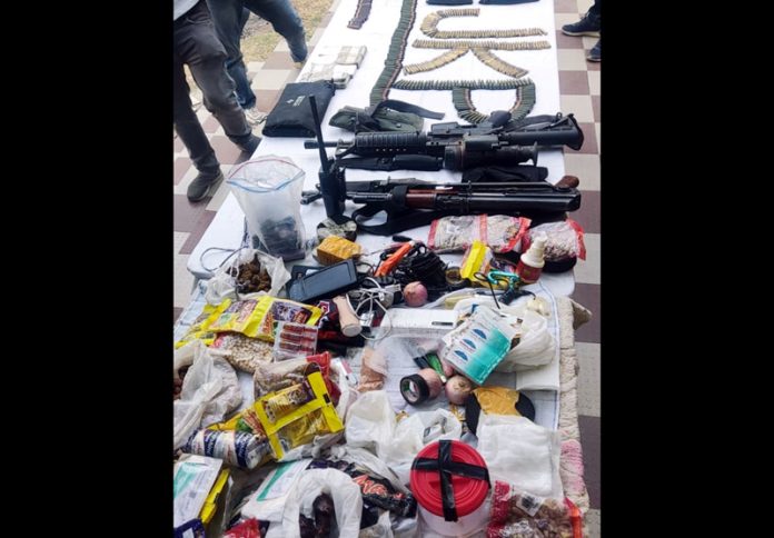 Arms, cash and Pak made eatables recovered from slain terrorists in Hiranagar on Wednesday. -Excelsior/Pradeep