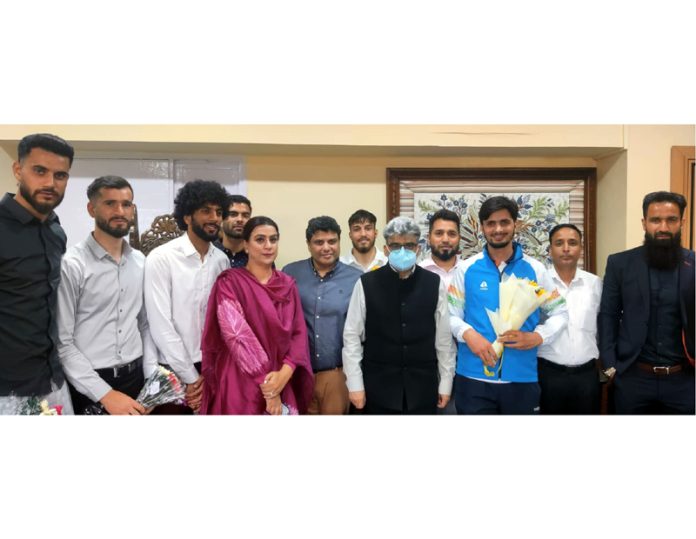 Chief Secretary, Atal Dulloo posing along with Amir Ahmad Bhat, who is going to take part in Paralympics.