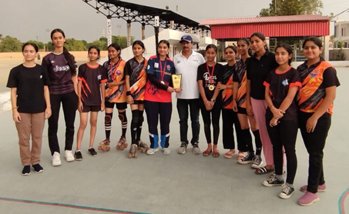 Rollball players posing along with Coach Madhu Sharma at Kathua. Rollball players posing along with Coach Madhu Sharma at Kathua.