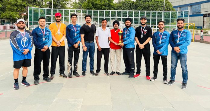 Inline Hockey team and JKRSA members posing along with the trophy.