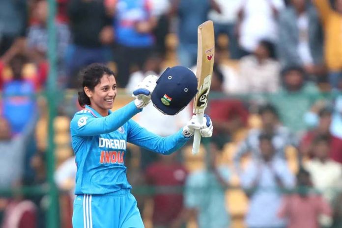 Smriti Mandhana raising her bat after scoring 136 runs against South Africa at Bengaluru on Wednesday. Smriti Mandhana raising her bat after scoring 136 runs against South Africa at Bengaluru on Wednesday.
