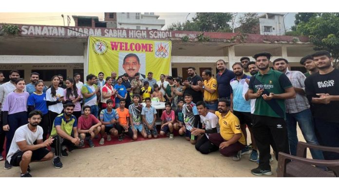 Players posing during an event on Handball Day at Jammu.