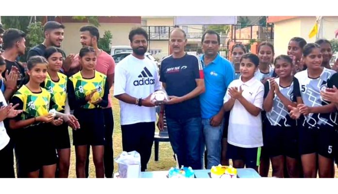 Players being presented Handballs during an event at Jammu.