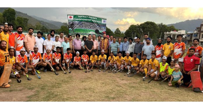 Hockey players posing along with dignitaries at Poonch. Hockey players posing along with dignitaries at Poonch.