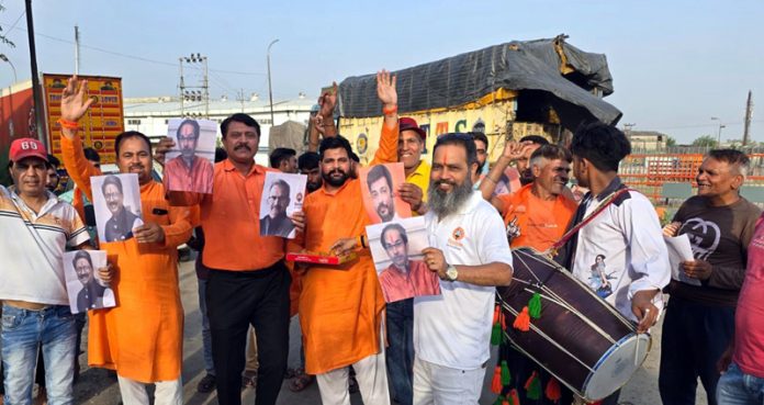 Activists of Shiv Sena Bala Saheb Thackeray celebrating party's victory in Maharashtra, at Jammu. Activists of Shiv Sena Bala Saheb Thackeray celebrating party's victory in Maharashtra, at Jammu.