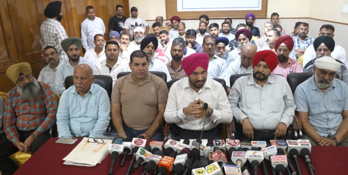 AJKTWA Chairman Ajit Singh and other Transport Union heads addressing joint press conference in Jammu. -Excelsior/Rakesh AJKTWA Chairman Ajit Singh and other Transport Union heads addressing joint press conference in Jammu. -Excelsior/Rakesh